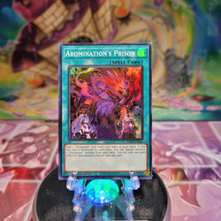 A Super Rare "Abomination's Prison" card from the Yugioh Set: Rarity Collection 2 (RA02).