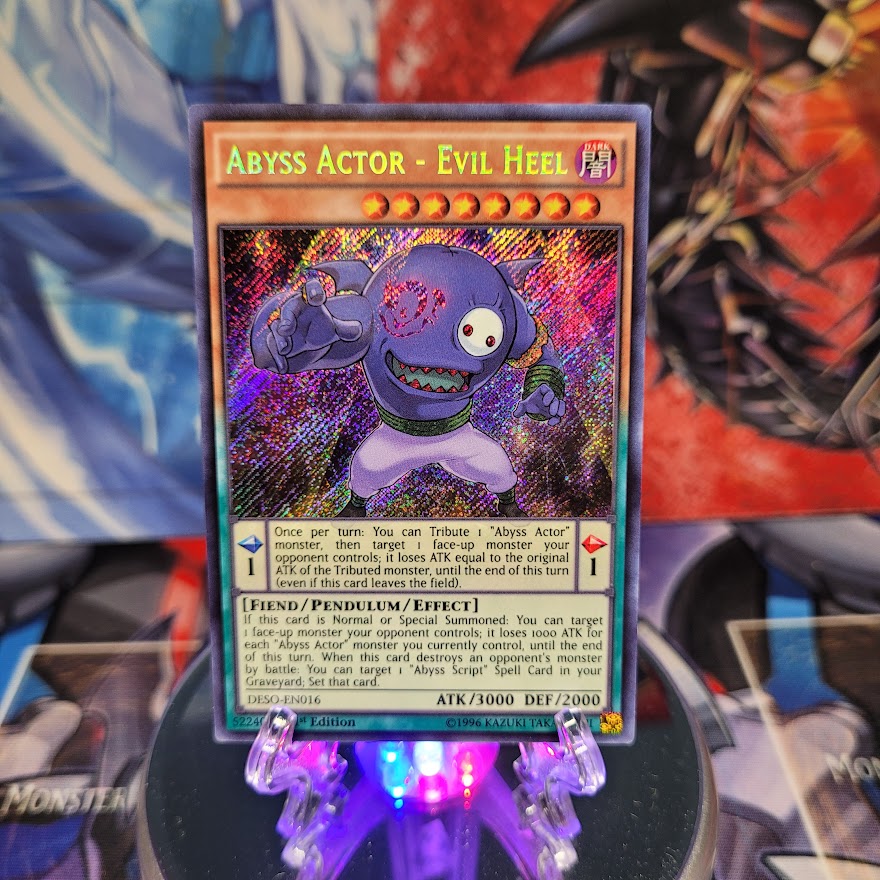  A Secret Rare "Abyss Actor - Evil Heel" card from the Yugioh Set: Destiny Soldiers.