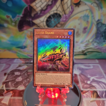 An Ultra Rare "Abyss Shark" card from the Yugioh Set: Quarter Century Bonanza (RA03).