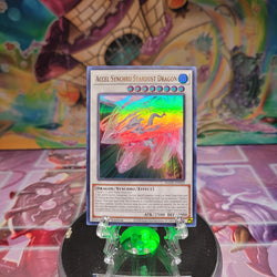 An Ultra Rare "Accel Synchro Stardust Dragon" card from the Yugioh Set: Maze of Memories (MAZE).