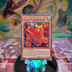 A Secret Rare "Achichi @Ignister"  card from the Yugioh Set: Ignition Assault (IGAS).