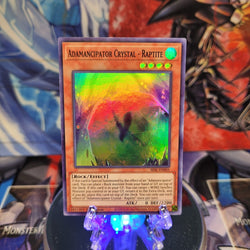  A Super Rare "Adamancipator Crystal - Raptite" card from the Yugioh Set: Secret Slayers.