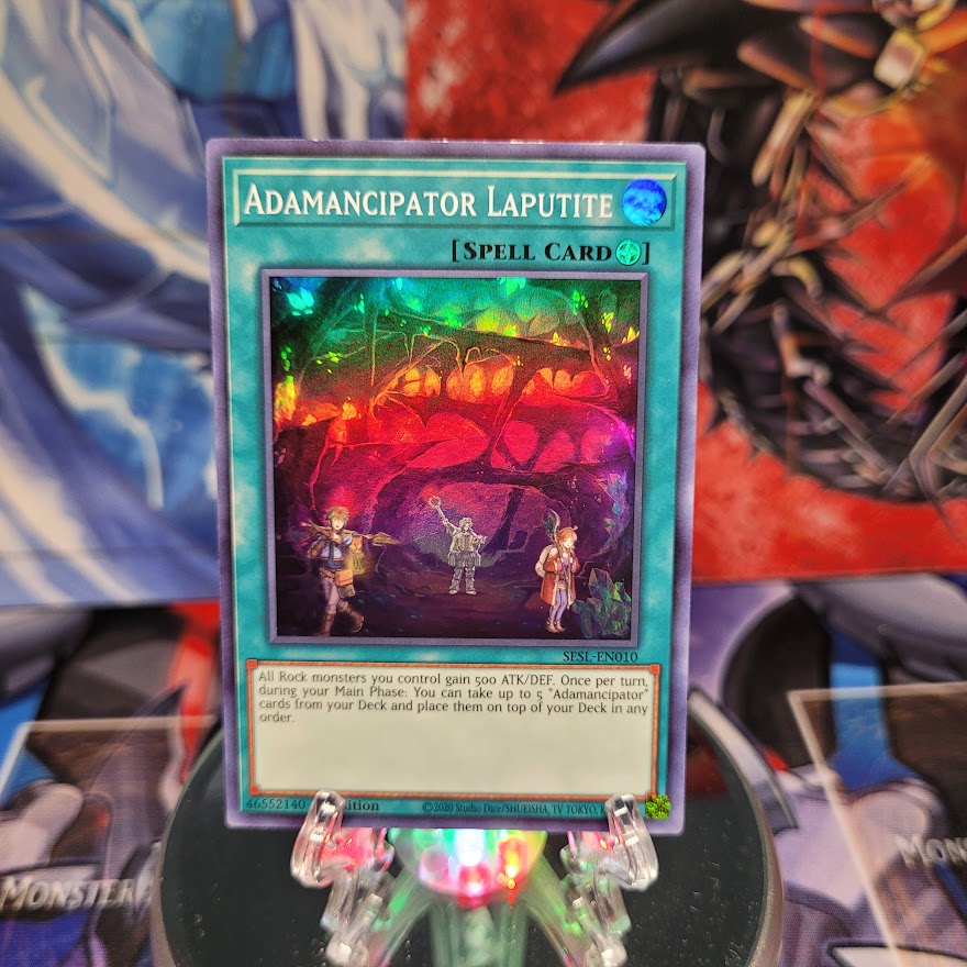  A Super Rare "Adamancipator Laputite" card from the Yugioh Set: Secret Slayers.