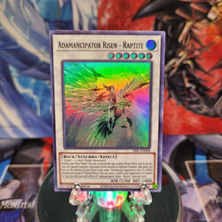  A Super Rare "Adamancipator Risen - Raptite" card from the Yugioh Set: Secret Slayers.