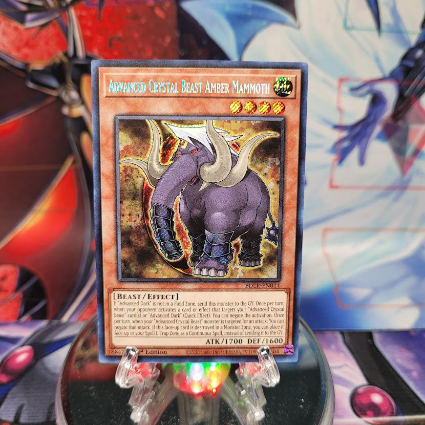 A Secret Rare "Advanced Crystal Beast Amber Mammoth" card from the Yugioh Set: Battles of Legend: Crystal Revenge.