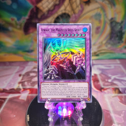 A 1st edition Super Rare "Aiwass the Magistus Spell Spirit" card from the Yugioh Set: Genesis Impact.