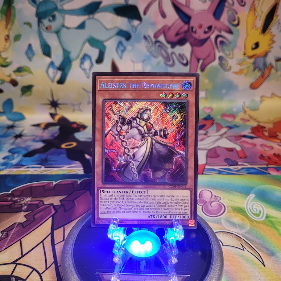 A Secret Rare “Aleister the Reminiscent” card from the Yugioh Set: Chaos Origins (CORI).