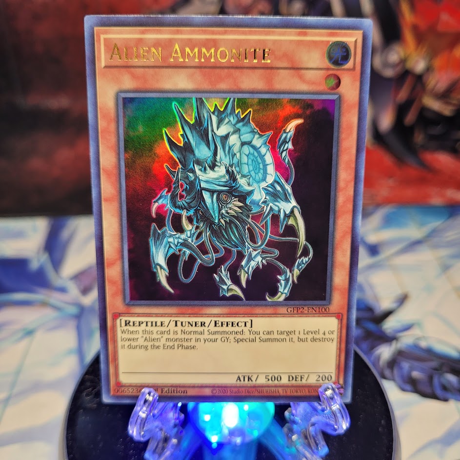  An Ultra Rare "Alien Ammonite" card from the Yugioh Set: Ghosts From the Past: The 2nd Haunting (GFP2).