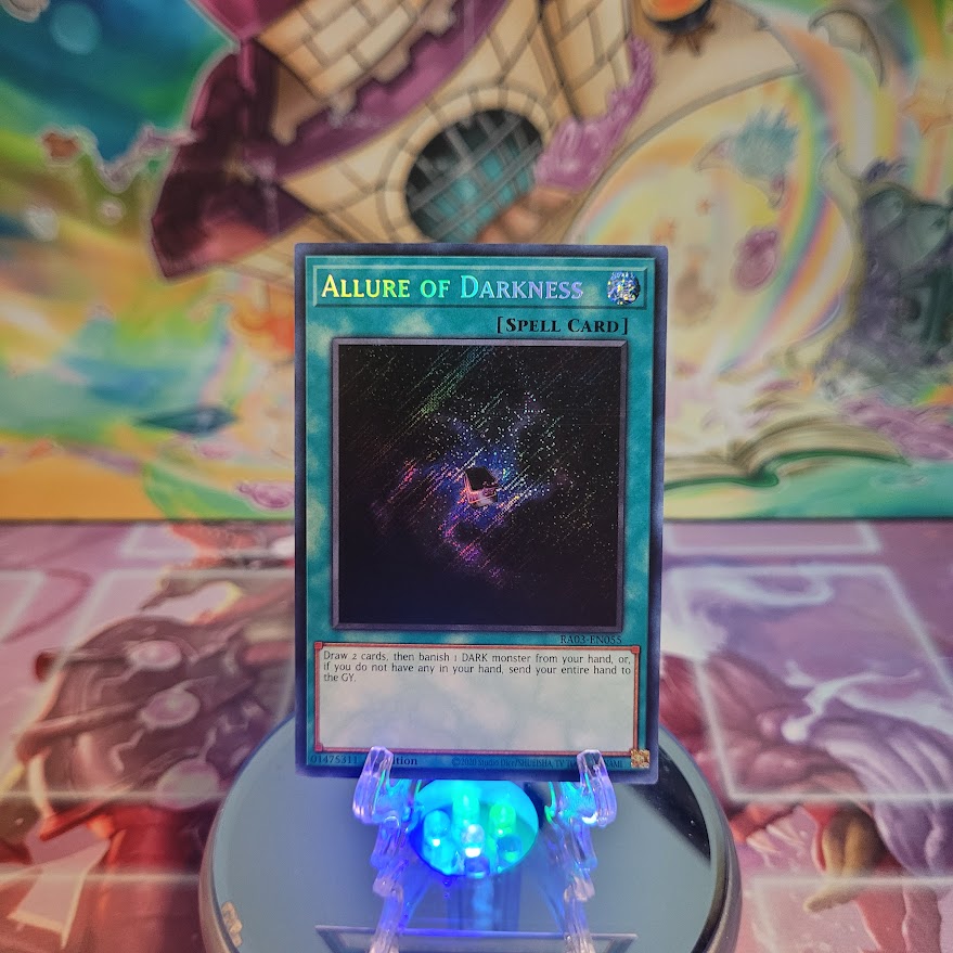  A Secret Rare "Allure of Darkness" card from the Yugioh Set: Quarter Century Bonanza (RA03).
