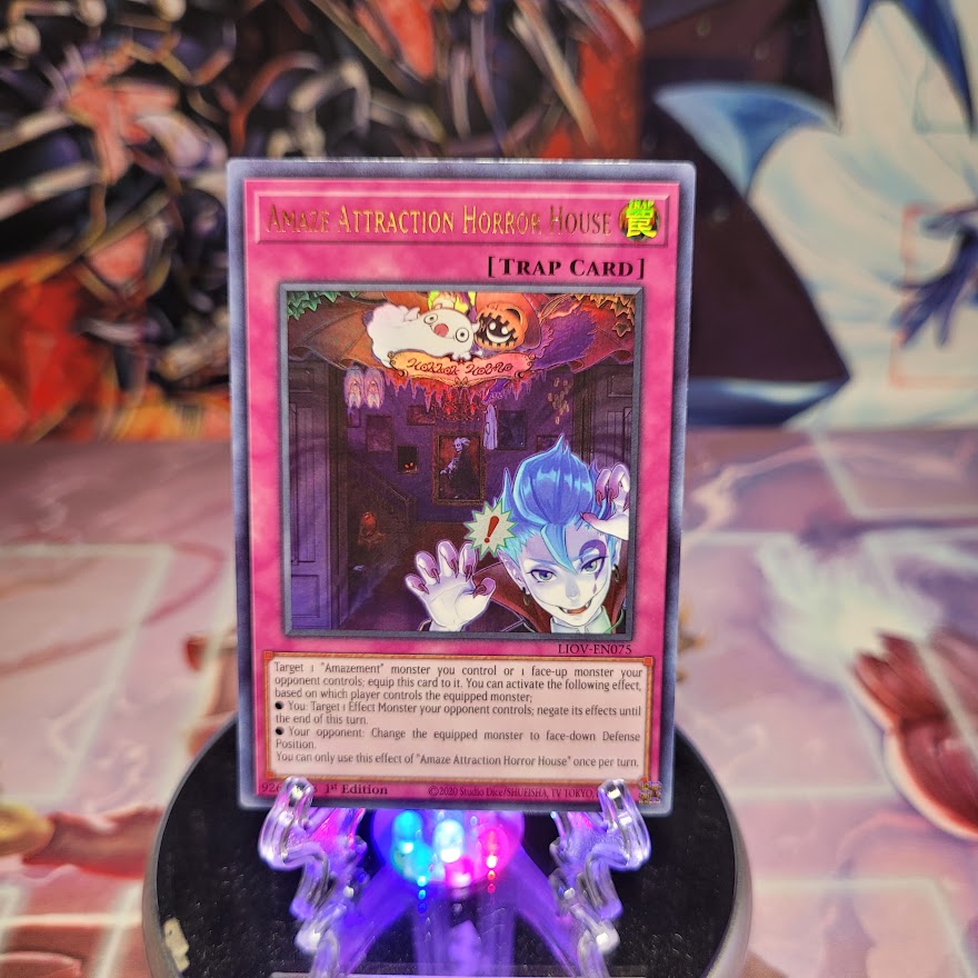 An Ultra Rare "Amaze Attraction Horror House" card from the Yugioh Set: Lightning Overdrive (LIOV).