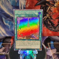  A Super Rare "Amazement Precious Park" card from the Yugioh Set: Lightning Overdrive.