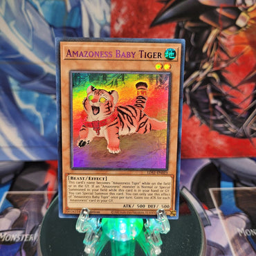 An Ultra Rare Purple "Amazoness Baby Tiger" card from the Yugioh Set: Legendary Duelists: Season 1.