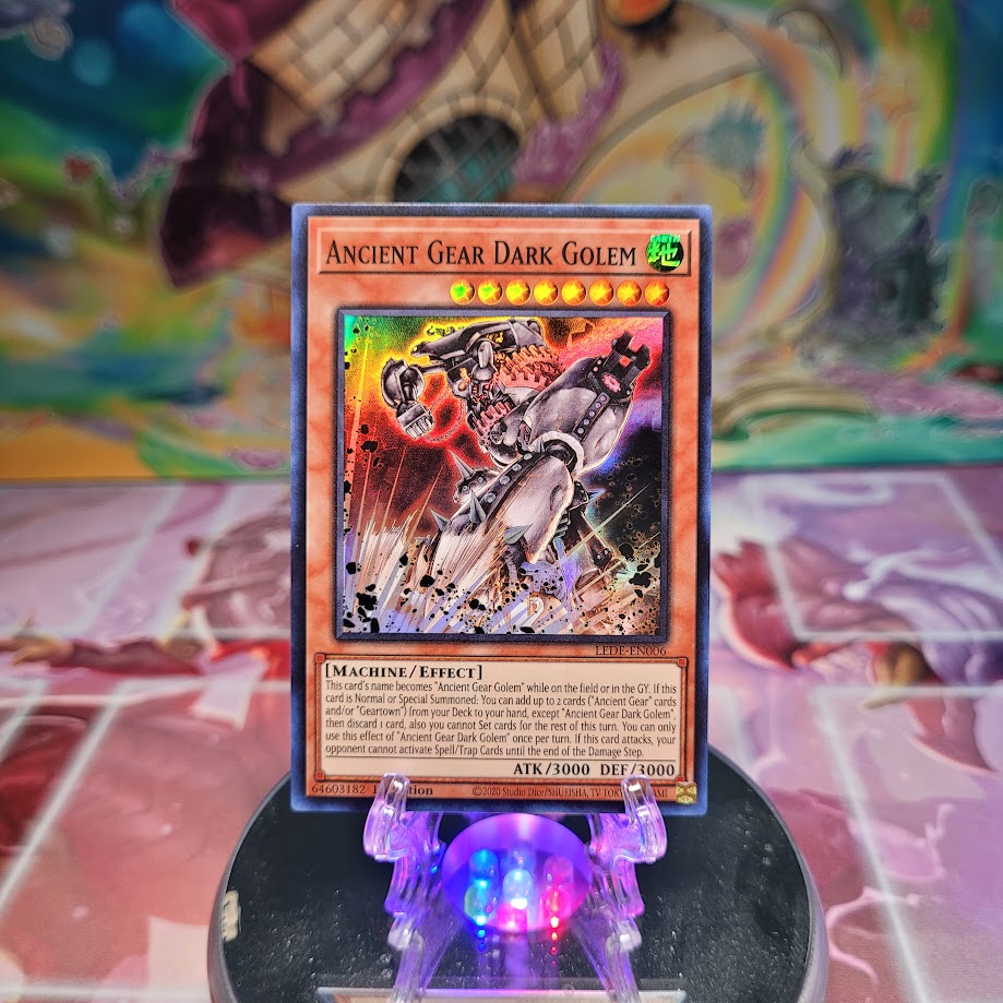 A Super Rare "Ancient Gear Dark Golem" card from the Yugioh Set: Legacy of Destruction.