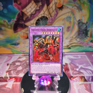 A Super Rare "Ancient Gear Howitzer" card from the Yugioh Set: Quarter Century Bonanza (RA03).