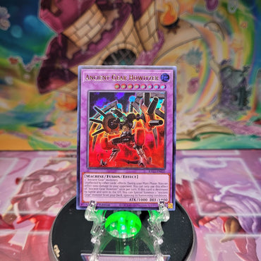 An Ultra Rare "Ancient Gear Howitzer" card from the Yugioh Set: Quarter Century Bonanza (RA03).