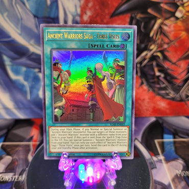 An Ultra Rare "Ancient Warriors - Three Visits" card from the Yugioh Set: Ignition Assault.