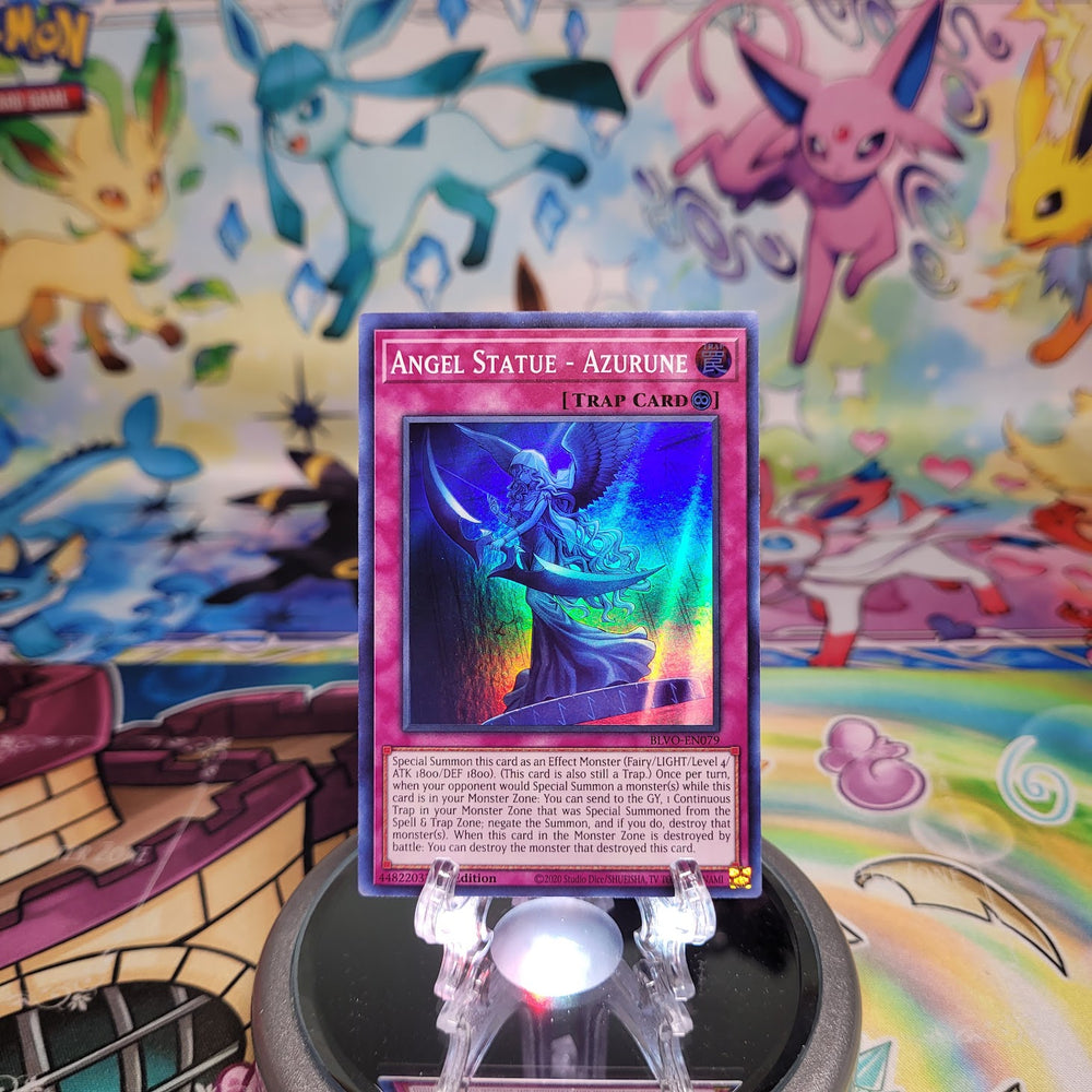 A Super Rare "Angel Statue - Azurune" card from the Yugioh Set: Blazing Vortex (BLVO).