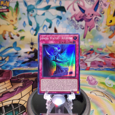 A Super Rare "Angel Statue - Azurune" card from the Yugioh Set: Blazing Vortex (BLVO).