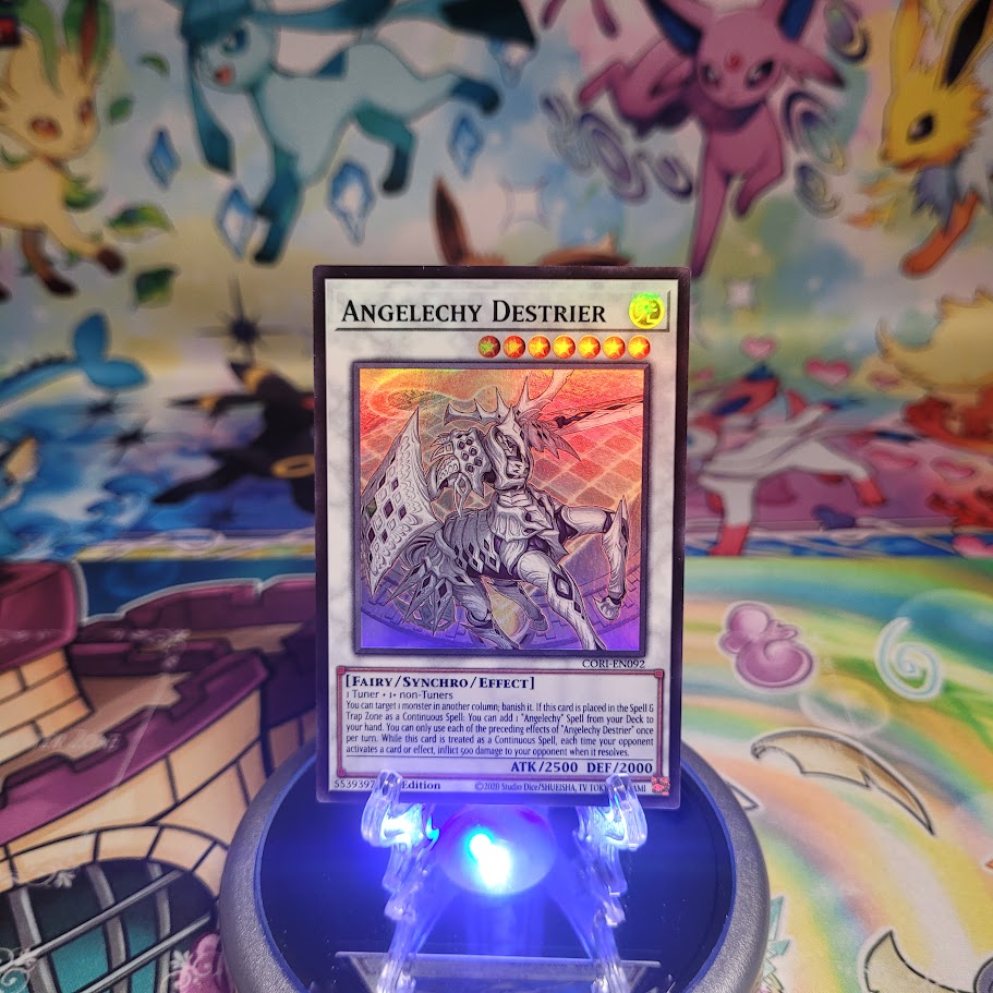 A Super Rare “Angelechy Destrier” card from the Yugioh Set: Chaos Origins (CORI).
