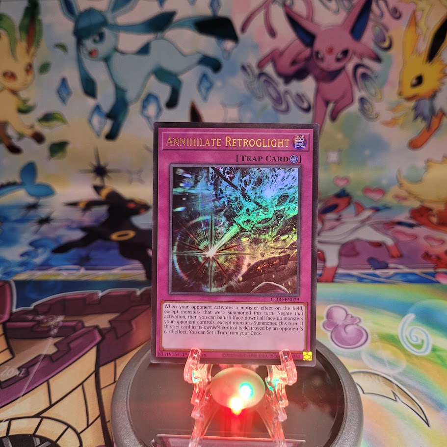 An Ultra Rare “Annihilate Retroglight” card from the Yugioh Set: Chaos Origins (CORI).
