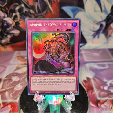 A Super Rare "Apophis the Swamp Deity" card from the Yugioh Set: Photon Hypernova.