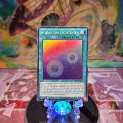 A Super Rare "Aquarium Lighting" card from the Yugioh Set: Dragons of Legend 2.