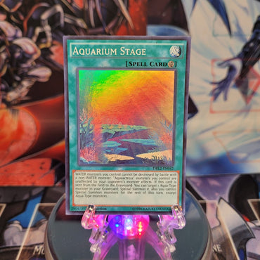 A Super Rare "Aquarium Stage" card from the Yugioh Set: Dragons of Legend 2.