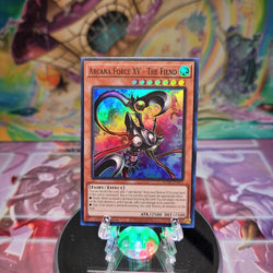 A Super Rare "Arcana Force XV - The Fiend" card from the Yugioh Set: Maze of Millennia.