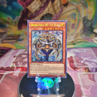 A Secret Rare "Arcana Force XXI - The World" card from the Yugioh Set: Speed Duel GX: Midterm Destruction (SGX4).