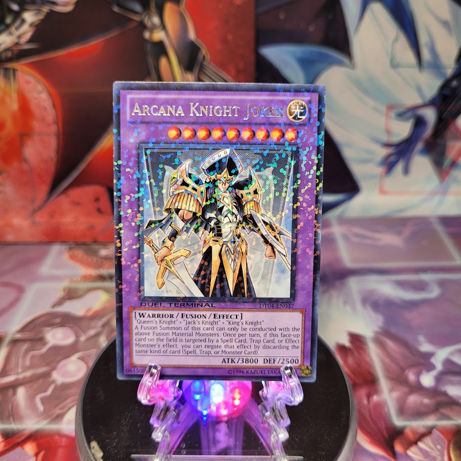 A Duel Terminal Rare "Arcana Knight Joker" card from the Yugioh Set: Duel Terminal 4 (DT04).