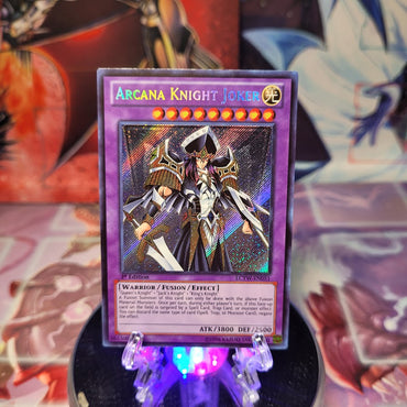 A Secret Rare "Arcana Knight Joker" card from the Yugioh Set: Legendary Collection 3: Yugi's World.