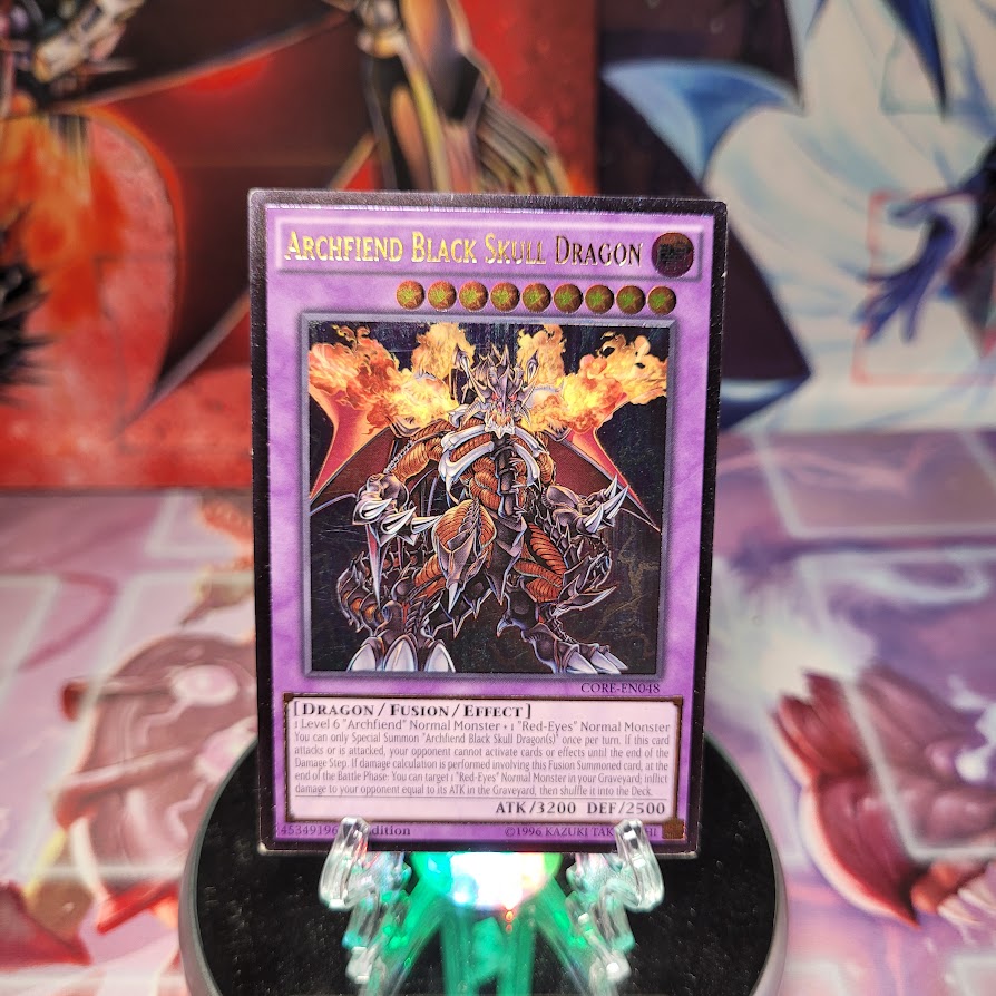 An Ultimate Rare "Archfiend Black Skull Dragon" card from the Yugioh Set: Clash of Rebellions.