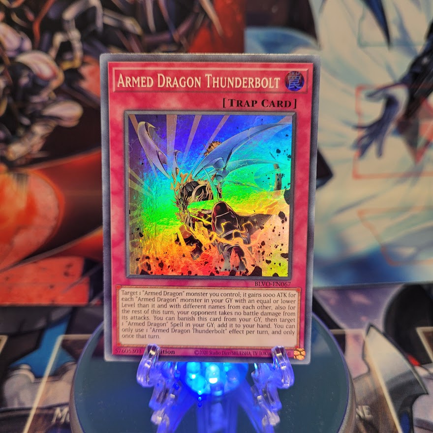 A Super Rare "Armed Dragon Thunderbolt" card from the Yugioh Set: Blazing Vortex.