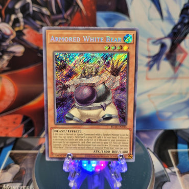  A Secret Rare "Armored White Bear" card from the Yugioh Set: Battles of Legend: Armageddon.