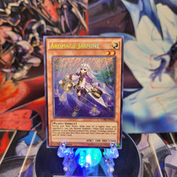 A Secret Rare "Aromage Jasmine" card from the Yugioh Set: Clash of Rebellions.