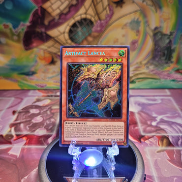 A Secret Rare "Artifact Lancea" card from the Yugioh Set: Battles of Legend: Monster Mayhem (BLMM).