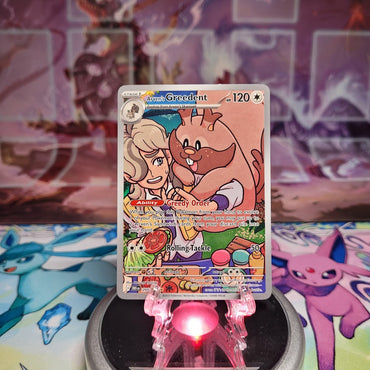 An Illustration Rare "Arven's Greedent" (205/182) card from the Pokemon Set: Scarlet & Violet: Destined Rivals (DRI).