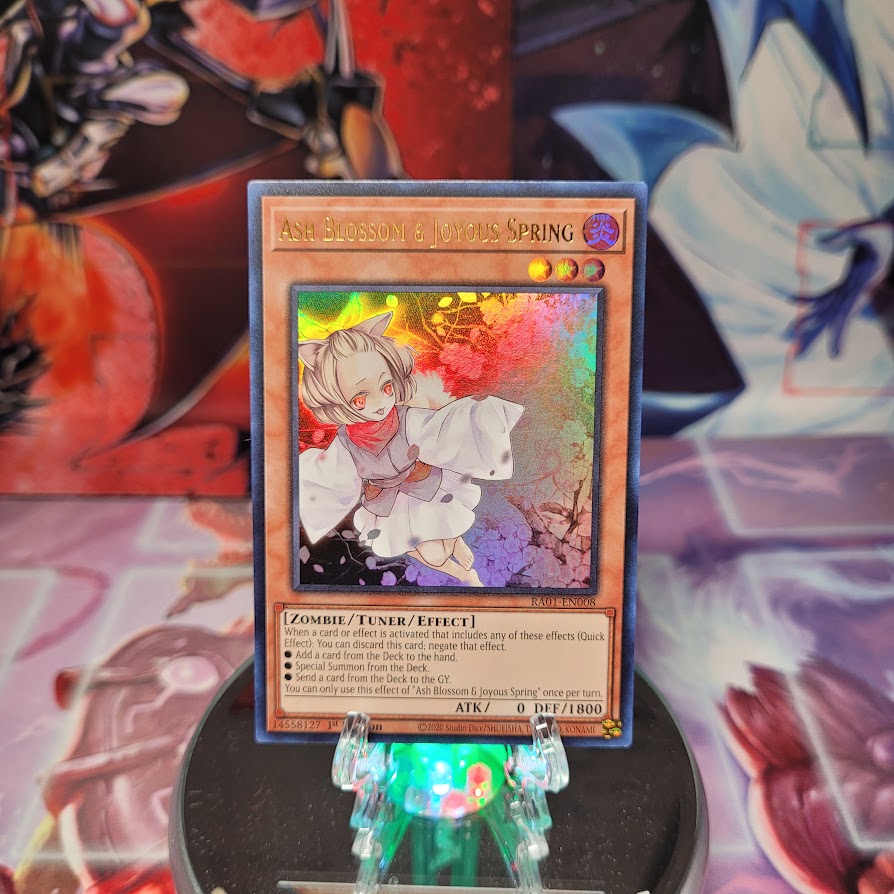 An Ultra Rare "Ash Blossom & Joyous Spring" card from the Yugioh Set: Rarity Collection 1 (RA01).