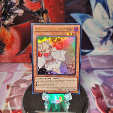 An Ultra Rare "Ash Blossom & Joyous Spring" card from the Yugioh Set: Rarity Collection 1 (RA01).