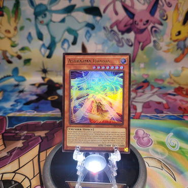 An Ultra Rare “Astrazma Urania” card from the Yugioh Set: Chaos Origins (CORI).