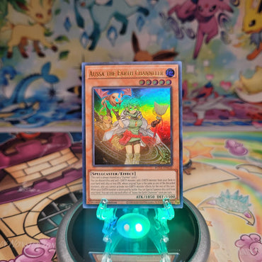 An Ultra Rare "Aussa the Earth Channeler" card from the Yugioh Set: Power of the Elements (POTE).