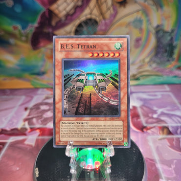 An Ulimited Edition Super Rare "B.E.S. Tetran" card from the Yugioh Set: Elemental Energy.