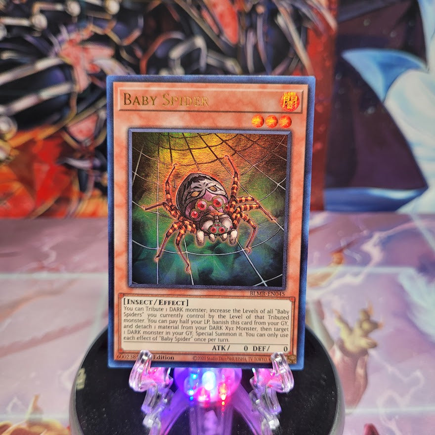 An Ultra Rare "Baby Spider" card from the Yugioh Set: Battles of Legend: Monstrous Revenge.