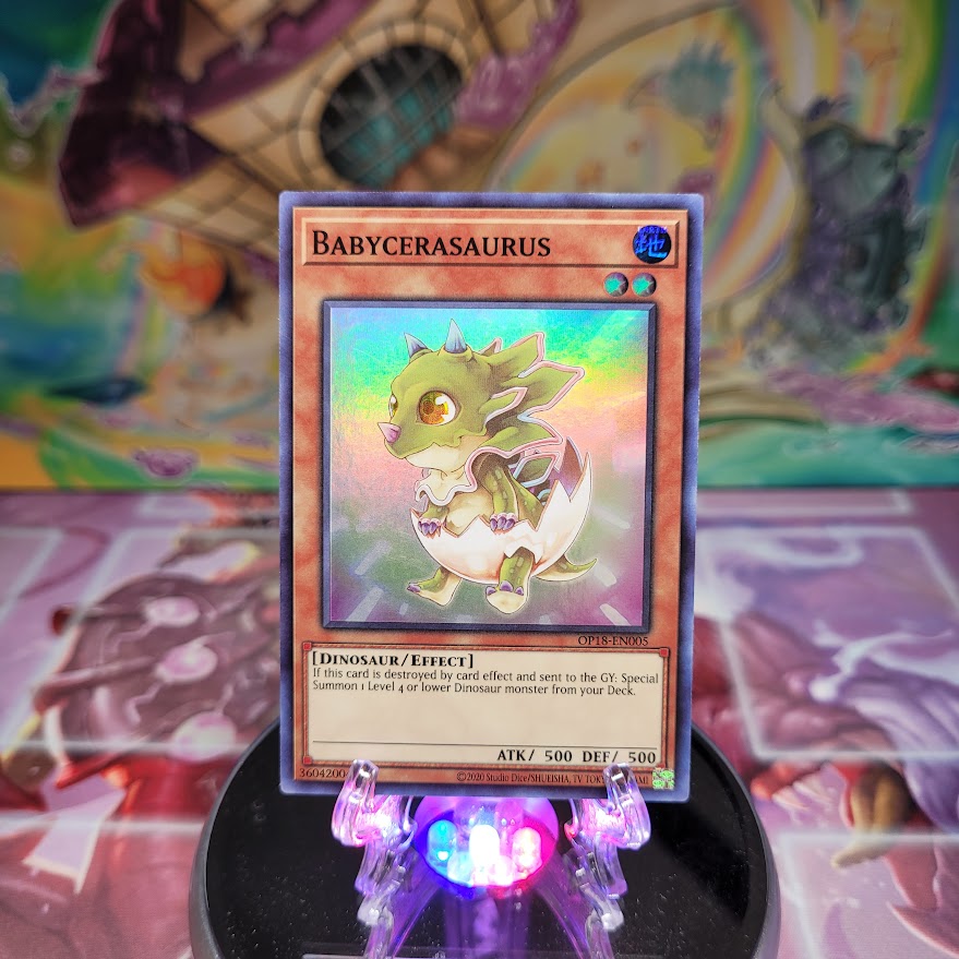 A Super Rare "Babycerasaurus" card from the Yugioh OTS Tournament Pack 18 set.