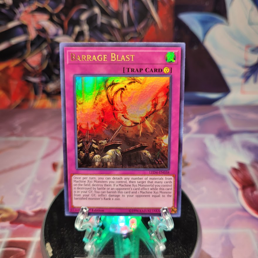 An Ultra Rare "Barrage Blast" card from the Yugioh Set: Legendary Duelists: Sisters of the Rose (LED4).