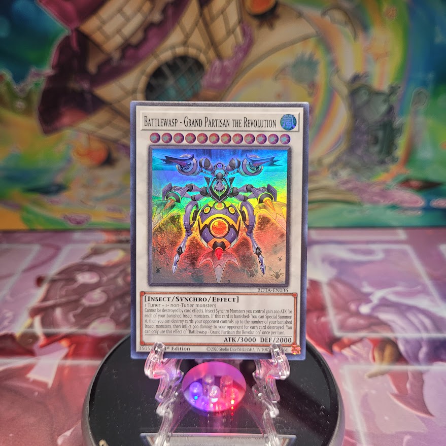 A Super Rare "Battlewasp - Grand Partisan the Revolution" card from the Yugioh Set: Rage of the Abyss (ROTA).