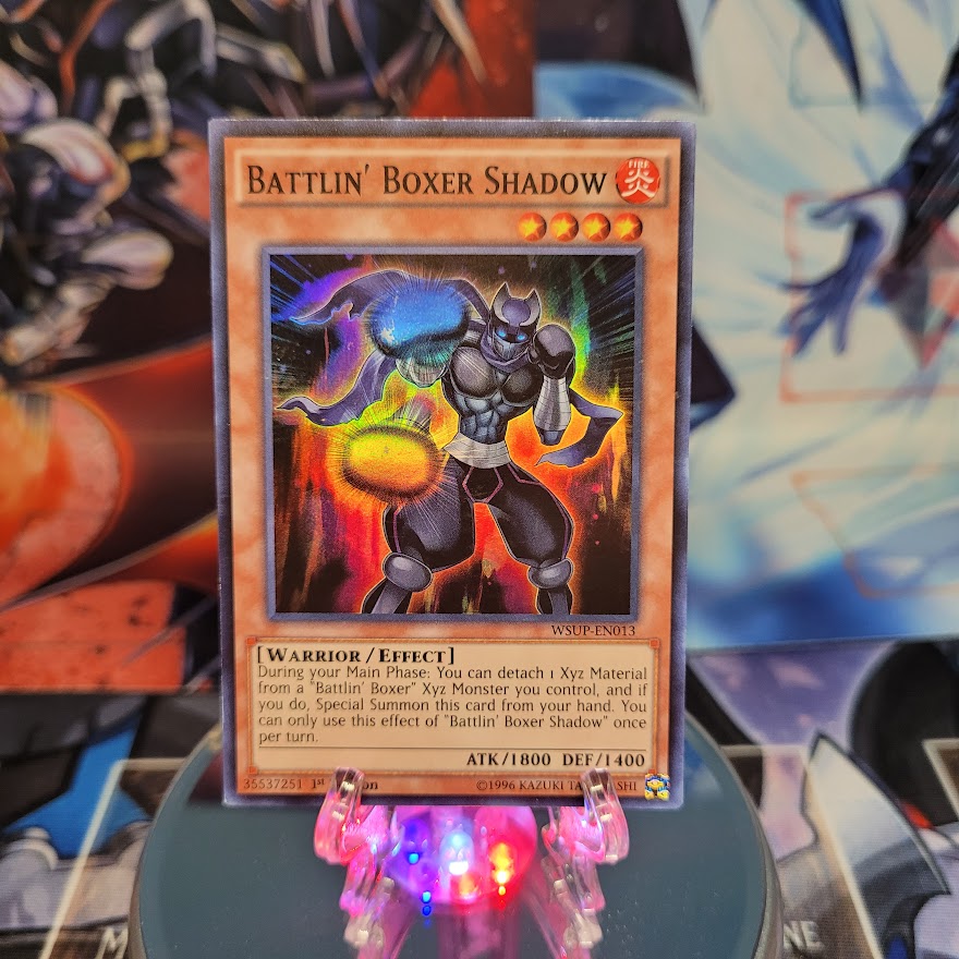 A Super Rare "Battlin' Boxer Shadow" card from the Yugioh Set: World Superstars.