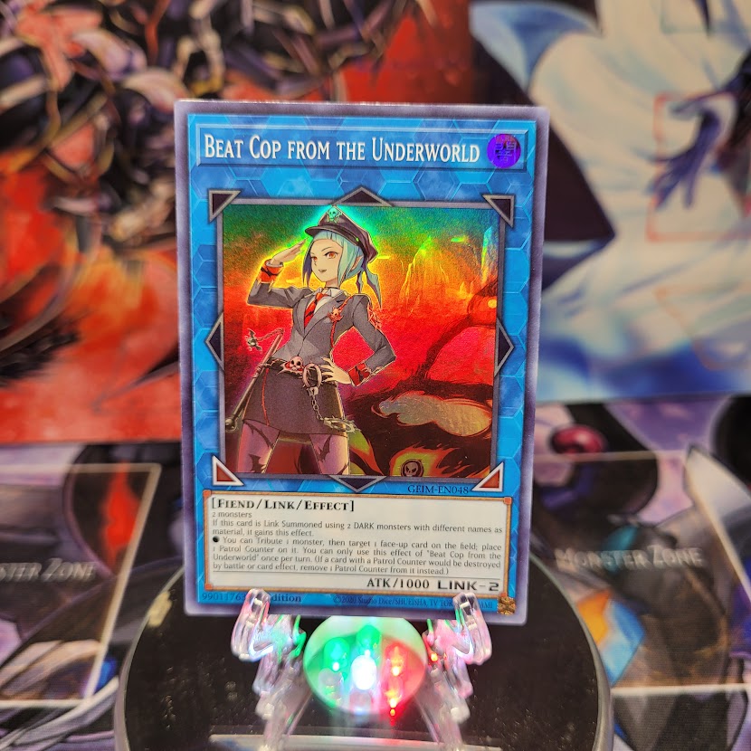 A Super Rare "Beat Cop From the Underworld" card from the Yugioh Set: Genesis Impact.