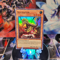 A Super Rare "Beatraptor" card from the Yugioh Set: Dark Neostorm.