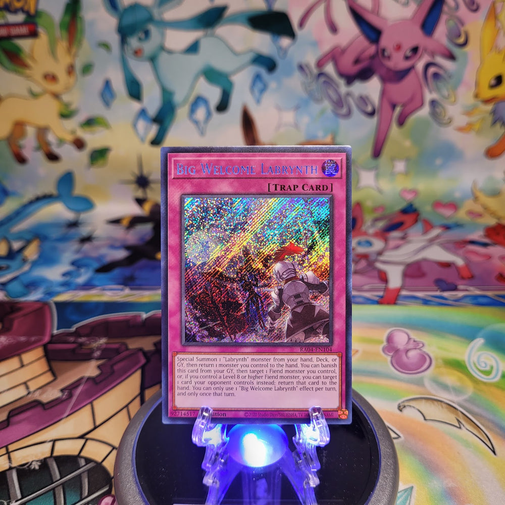 A Secret Rare "Big Welcome Labrynth" card from the Yugioh Set: Quarter Century Stampede (RA04).